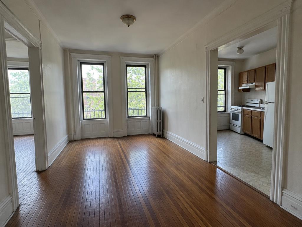 Illustrative 3 BR interior for the Bedford-Stuyvesant budget example — not a real listing
