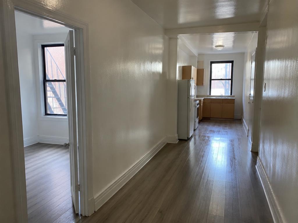 Illustrative 2 BR interior for the East Harlem budget example — not a real listing