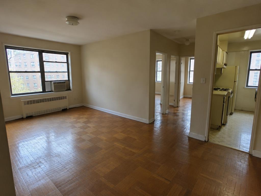 Illustrative 2 BR interior for the Woodside budget example — not a real listing